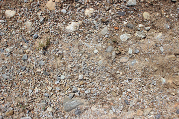 Gravel dirt road stones close up horizontal