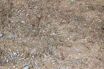 Gravel dirt road stones close up horizontal