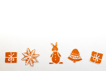 Gingerbread cookies over white background. Top view with.