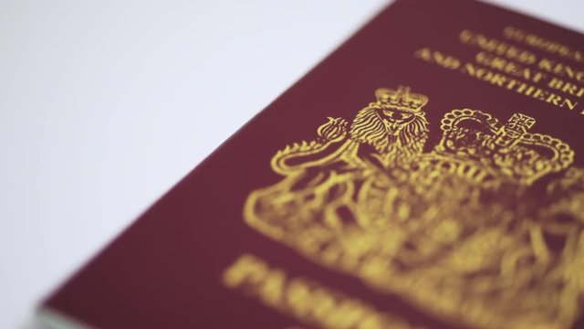 UK Passport HD Footage against a white background with a sliding camera move 