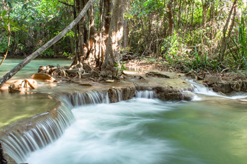 Waterfall flowing from the mountains at Huay Mae khamin waterfall National Park ,Kanchana buri in Thailand.