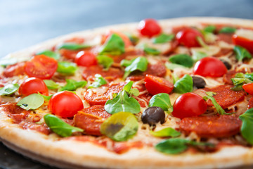 Sausage Pizza with Ham and tomatoes