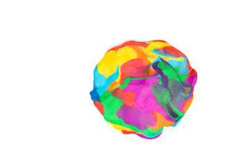 Multicolored plasticine circle on white background. Isolated on white. Texture of plasticine