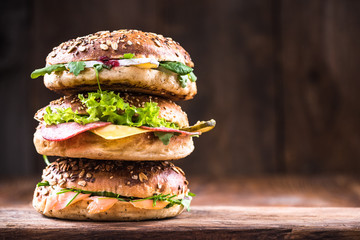 Healthy bagels tower,copy space,wooden background