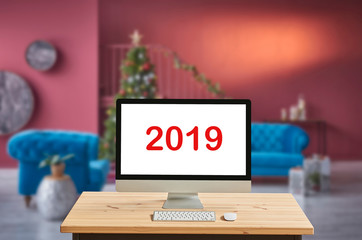 Desktop screen with Christmas concept, blur background, interior.