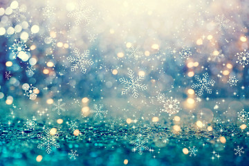 Beautiful snowflakes on an abstract shiny light background