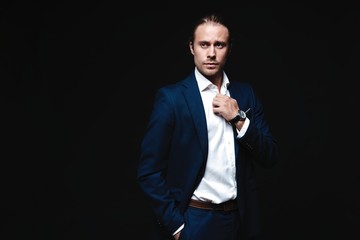 Elegant young handsome man. Studio fashion portrait