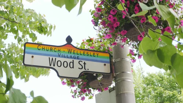 Wood Street street sign and flowers. Springtime in the Gay Village in Toronto, Canada.
