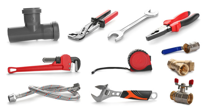 Set of different tools and fittings on white background. Plumber service