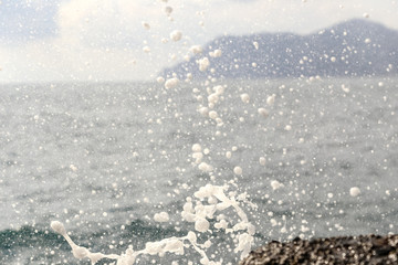 Sea waves Breaking Over Rocks