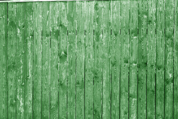 Fototapeta na wymiar Old wooden wall in green color.