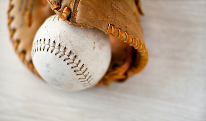Baseball glove and ball