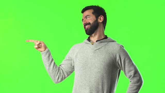 Man with beard on green screen chroma key background