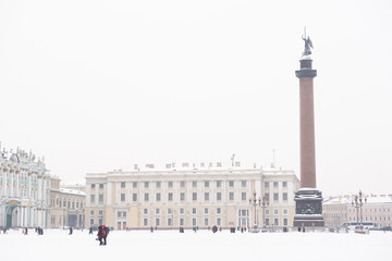 Fototapeta na wymiar Palace square and Alexander Columnin in winter St. petersburg, Russia