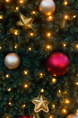 Obraz na płótnie Canvas christmas background with golden balls and stars