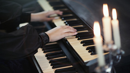 hands playing piano  harpsichord