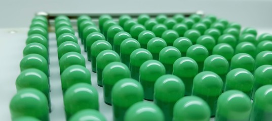 Fototapeta premium Green capsulas compounding