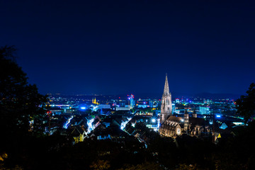 Germany, Freiburg im Breisgau in blue atmosphere in the night