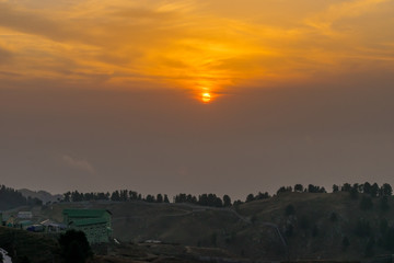 Dainkund- the singing hills-a sunset sky from the top of the hill