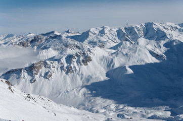 Fototapeta na wymiar Panorama of the mountain rounding the courchevel Valley, Part of the national parc of la Vanoise, France