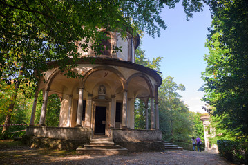 Fototapeta na wymiar Panoramic view of the seventeenth-century baroque chapels, dedicated to the life of St. Francis of Assisi, in the park of the Orta sanctuary on Lake Orta in Piedmont, Italy.