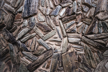 Textured wall of aged stones