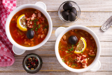Traditional Russian dish  solyanka - thick, spicy and sour saltwort soup.  View from above, top...