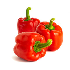 Three sweet bell peppers isolated on white background cutout