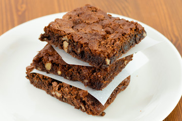 Chocolate brownie with hot chocolate melting sauce on it.