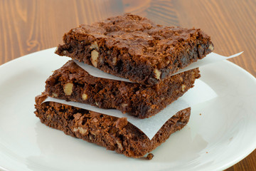 Chocolate brownie with hot chocolate melting sauce on it.