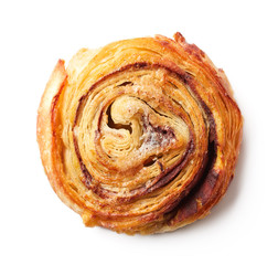 Sweet bun with cinnamon isolated on white, from above