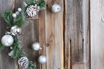 christmas decoration placed around the corner on a wooden background