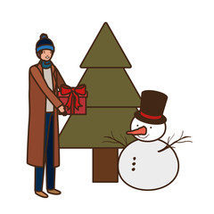 man with christmas tree and snowman