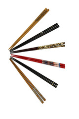 Group of hashi chopsticks arranged as rays.Radial design with chopsticks. Top view. Isolated on white background.