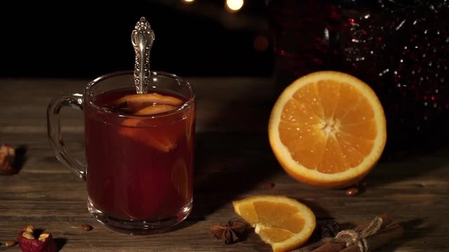 Close-up of mulled wine with orange