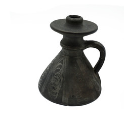 Traditional black ceramic pot, vase with black graphite decorations. Isolated on white background.   