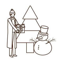 man with christmas tree and snowman