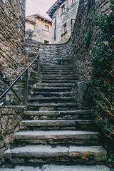 Stone ascendant stairs in a medieval village