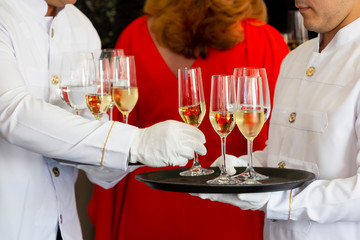 Waiters tray white wine