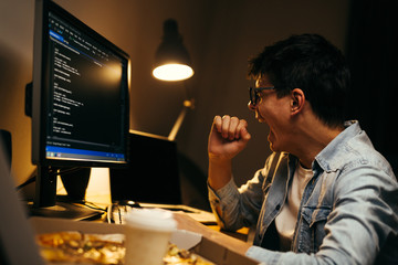 programmer working late night at his home