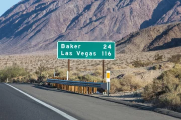 Fotobehang Las Vegas 116 miles highway on Interstate 15 near Baker in the Mojave Desert area of Southern California.   © trekandphoto