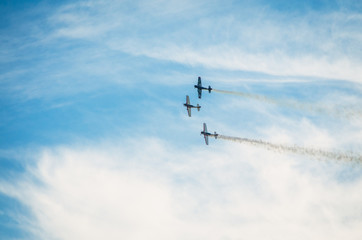 Fototapeta na wymiar Three airplanes in blue sky