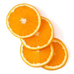 Orange fruit slice  isolated on white background closeup. Food background. Flat lay, top view.