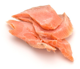 smoked salmon segments isolated on white background cutout. Prepared fish fillet fibres.