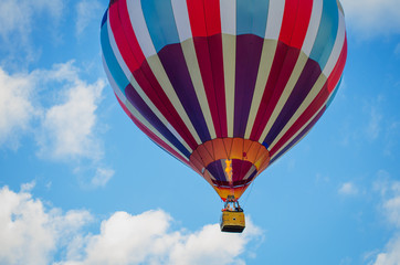 Hot air balloon in the blue sky