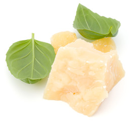 shredded parmesan cheese and basil leaf isolated on white background cutout