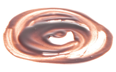 Chocolate syrup drop isolated on white background