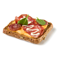 Canape with salami. Open faced sandwich crostini isolated on white background closeup. Appetizer tartarine.
