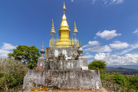The golden stupa on top of Mount Phou Si in Luang Prabang, Laos.