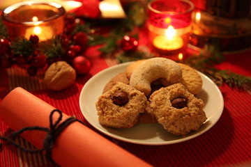 Christmas still-life with candle-light atmosphere and homemade cookies (light version)